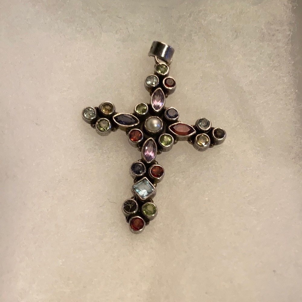 Cross Pendant with 25 tiny stones.
